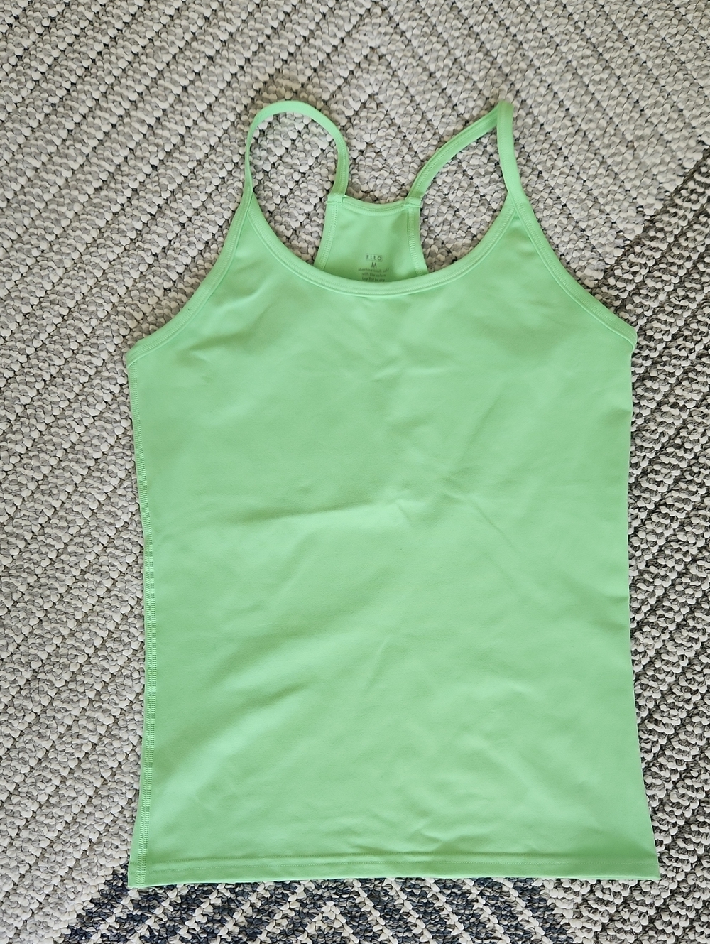 FLEO Switch Up Racerback Tank Top in Green. Full Length